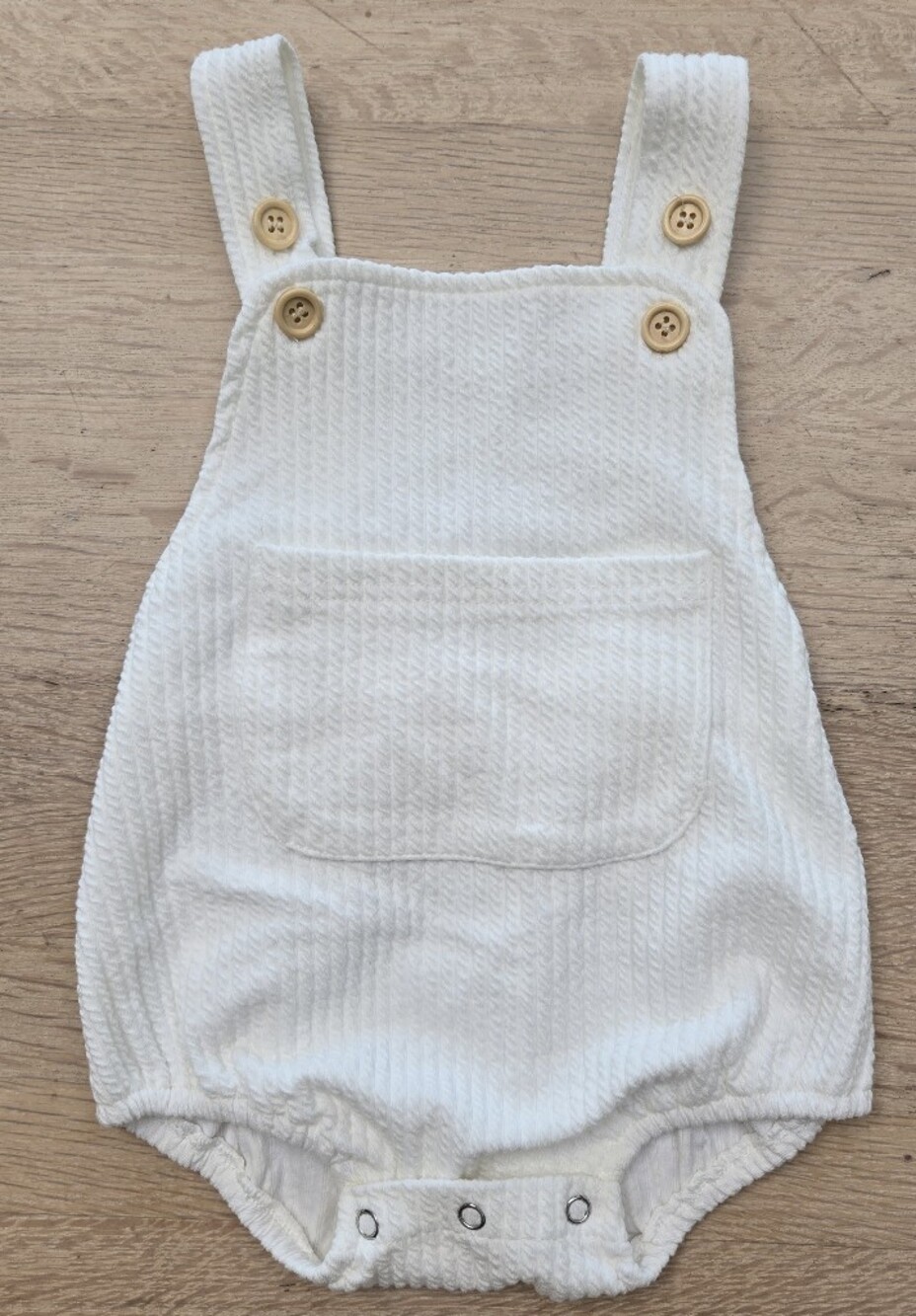 Three Peas Boutique White Textured Overalls with Front Pocket and Button Accent